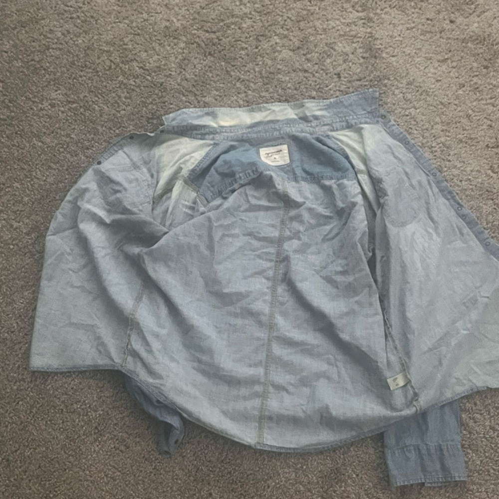 cute thin blue and white faded jean jacket